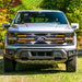 Armor Grille W/ DRL, Amber Lights & OEM Emblem Hole - Matte Black For 2024+ Ford F150 Tremor | American Modified